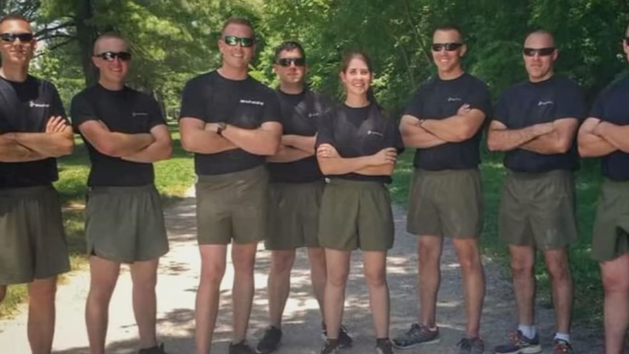 Olivia Kustes, pictured with fellow Marines